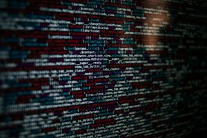 pexels-photo-4383298-4383298 Detailed image of computer source code displayed on a screen, showcasing web development elements.
